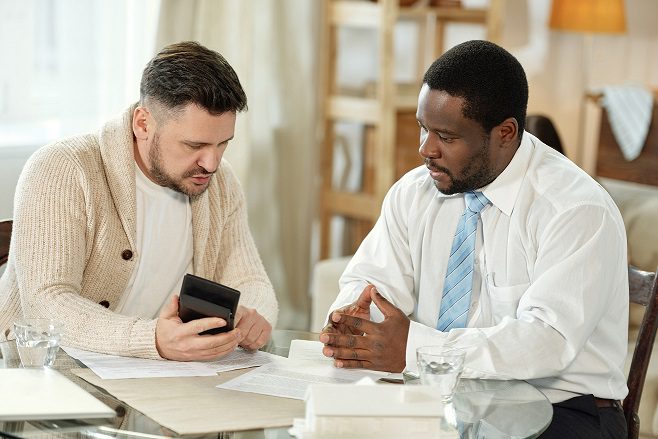 Adult man with adviser accounting house price