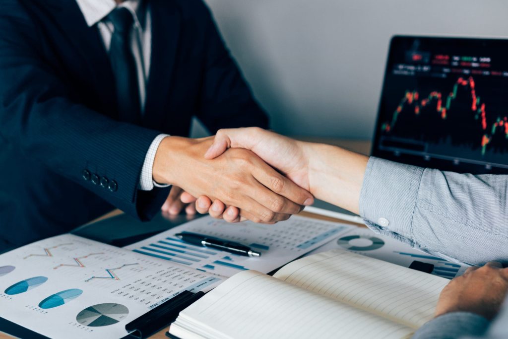 Two businessmen agreed to buy and sell shares by shaking hands i