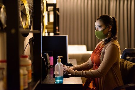 young-indian-woman-with-mask-working-from-home