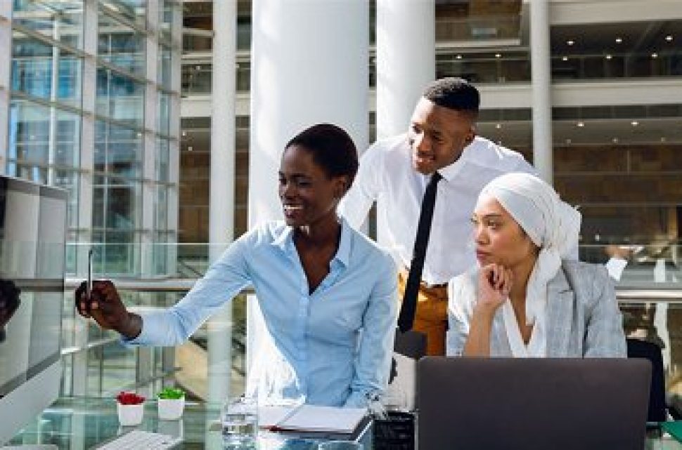 male-and-females-executives-discussing-over-CKHQZQR